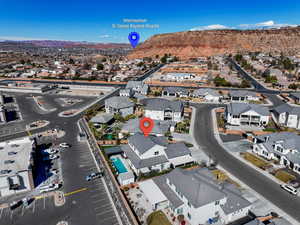 Birds eye view of property featuring a mountain view