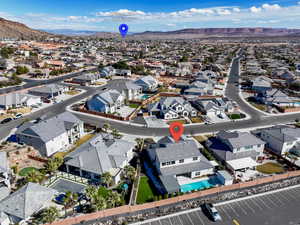 Drone / aerial view with a mountain view and a residential view