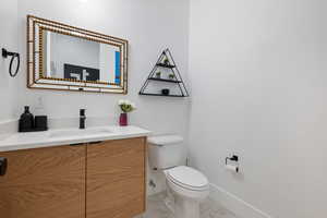 Bathroom with vanity and toilet