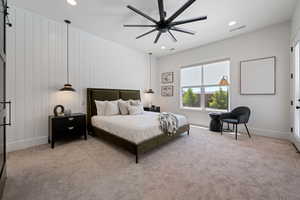 Carpeted bedroom featuring baseboards, a ceiling fan, recessed lighting, and visible vents