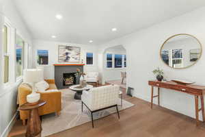 Living room with wood-type flooring