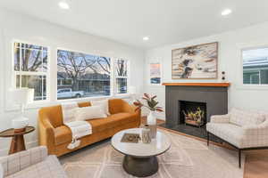 Living room with wood-type flooring