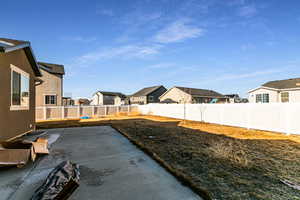 View of yard with a patio area
