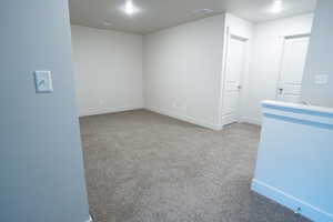 Spare room with light carpet