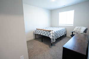 View of carpeted bedroom