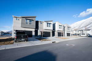 View of property with a garage