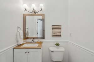 Bathroom with vanity and toilet