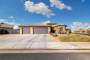 View of front of home featuring a garage