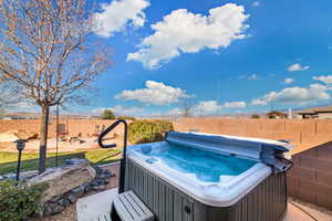 Exterior space featuring a hot tub