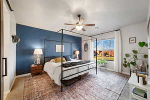 Bedroom with carpet floors and ceiling fan