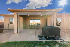 Rear view of house with a patio