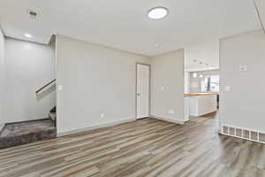 Unfurnished room featuring light hardwood / wood-style flooring