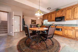 Kitchen featuring hanging light fixtures