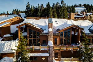 View of snow covered property