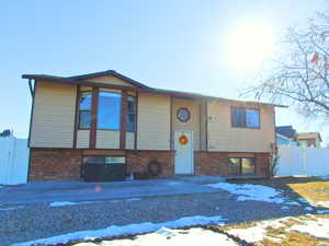 Bi-level home with a patio area