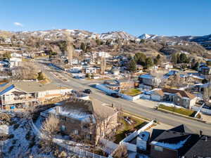 Birds eye view of property featuring a mountain view