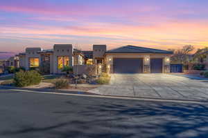 View of front of home featuring a garage