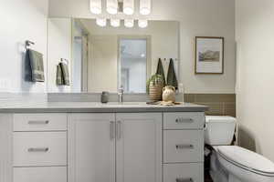 Bathroom with vanity and toilet