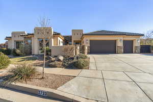 View of front of property featuring a garage