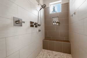 Bathroom with a tile shower