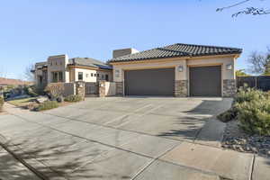 View of front of house with a garage