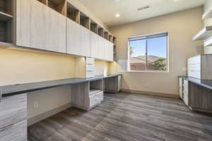 Interior space featuring dark wood-type flooring