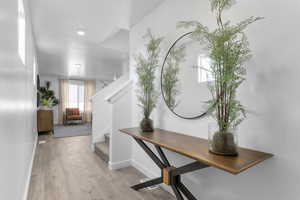 Entryway with light wood-type flooring