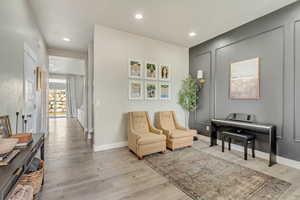 Living area featuring light hardwood / wood-style floors