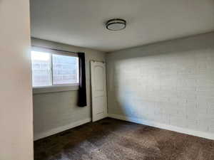 View of carpeted spare room