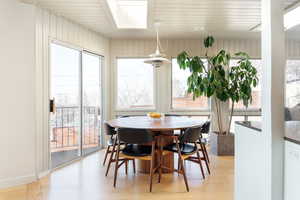 Dining space with light wood-type flooring