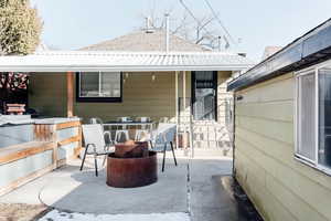 View of patio / terrace featuring a fire pit