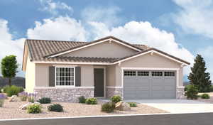 View of front facade featuring a garage