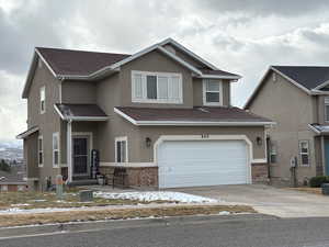 View of front of house featuring a garage