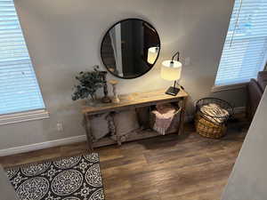 Sitting room featuring dark hardwood / wood-style floors