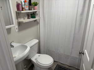 Bathroom with toilet and sink