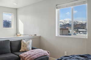 Bedroom featuring a mountain view