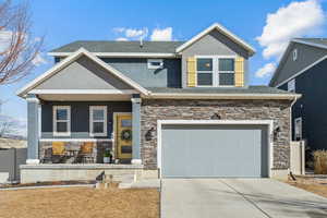 Craftsman-style home with a garage