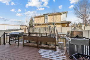 Wooden deck with a grill