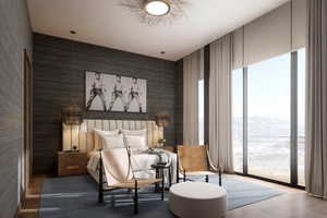 Bedroom featuring floor to ceiling windows, a mountain view, and access to outside