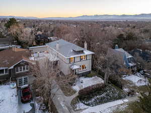 Aerial view at dusk featuring a mountain view