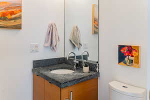 Bathroom with vanity and toilet