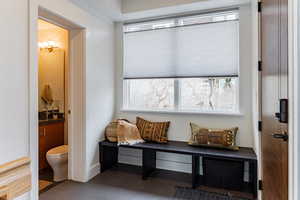 Sitting room with light tile patterned floors