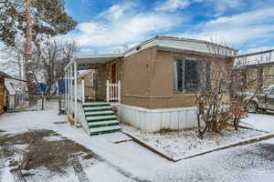 View of snow covered property