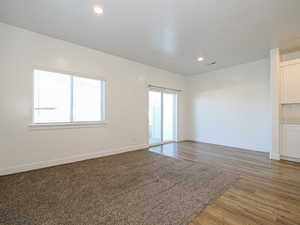 Unfurnished room featuring hardwood / wood-style flooring