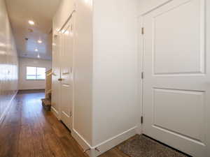 Hall featuring dark hardwood / wood-style flooring