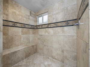 Walk-in shower inside basement bathroom