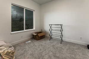 Living area featuring carpet floors