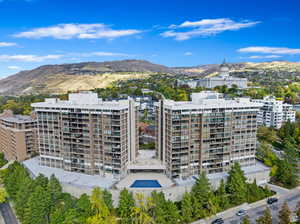 Birds eye view of property with a mountain view