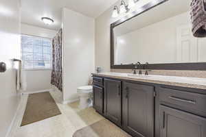 Spacious bathroom with large jetted tub.