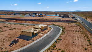 Birds eye view of property with a mountain view